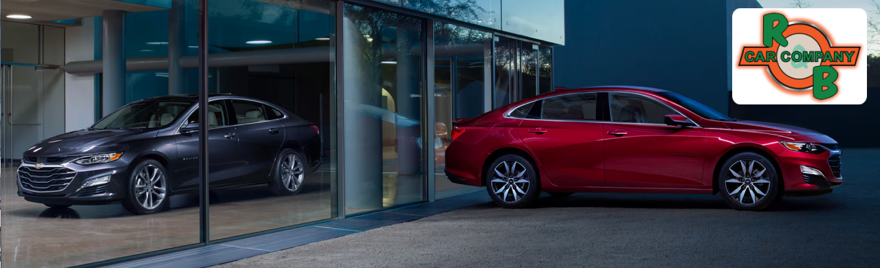 Exterior view of R&B Car Company dealership in South Bend, IN, showcasing a lineup of used Chevrolet vehicles.